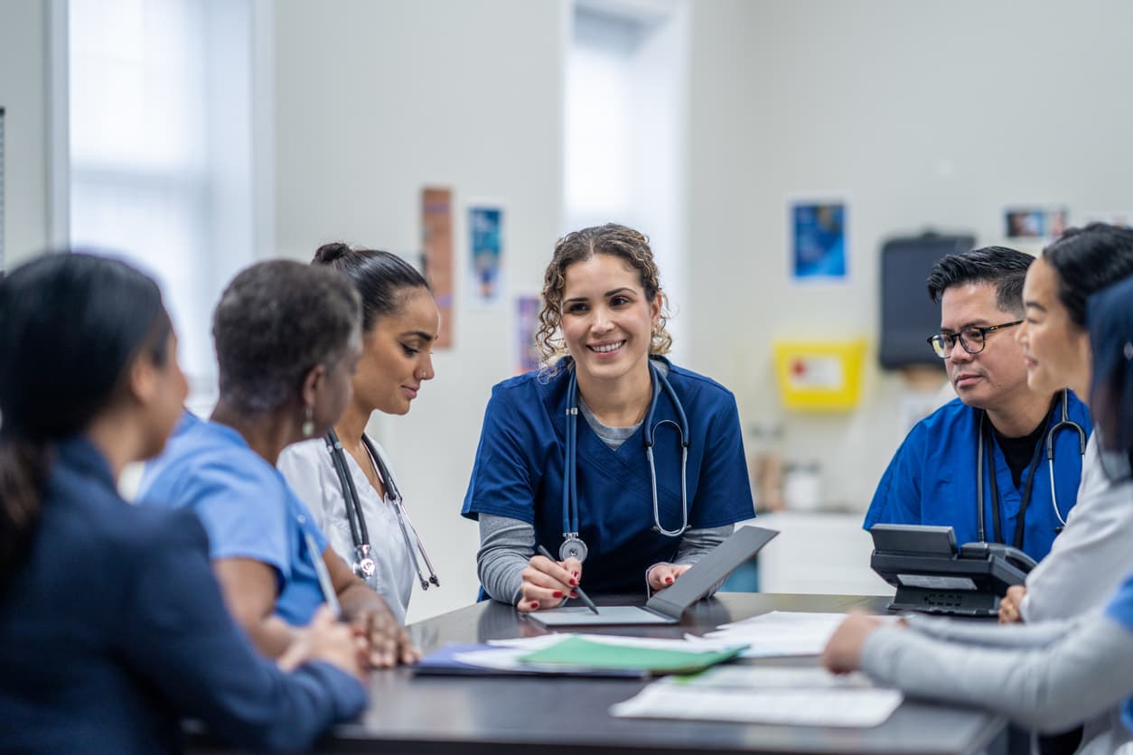 Healthcare professionals in a group coaching session